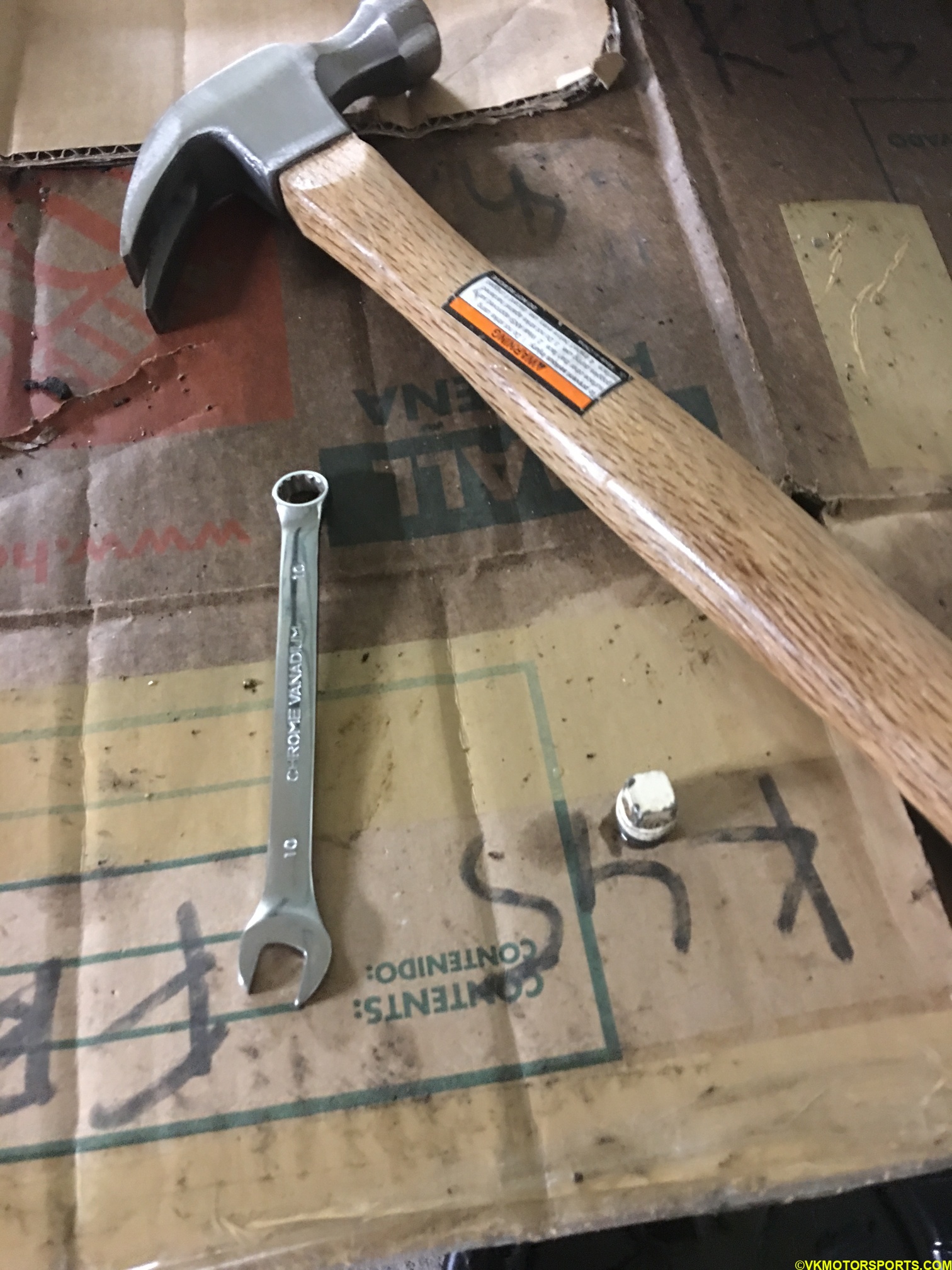 10mm wrench (spanner) and hammer