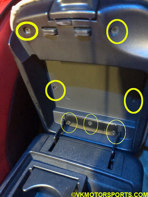Figure 1. 7 Screws in the center console lid