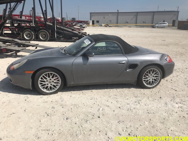 Figure 1. Porsche Boxster S at the Copart TX lot - driver side view