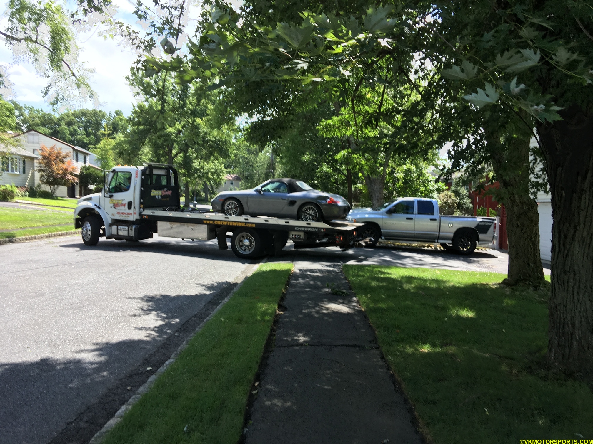 Figure 10. Boxster on the flat-bed tow truck