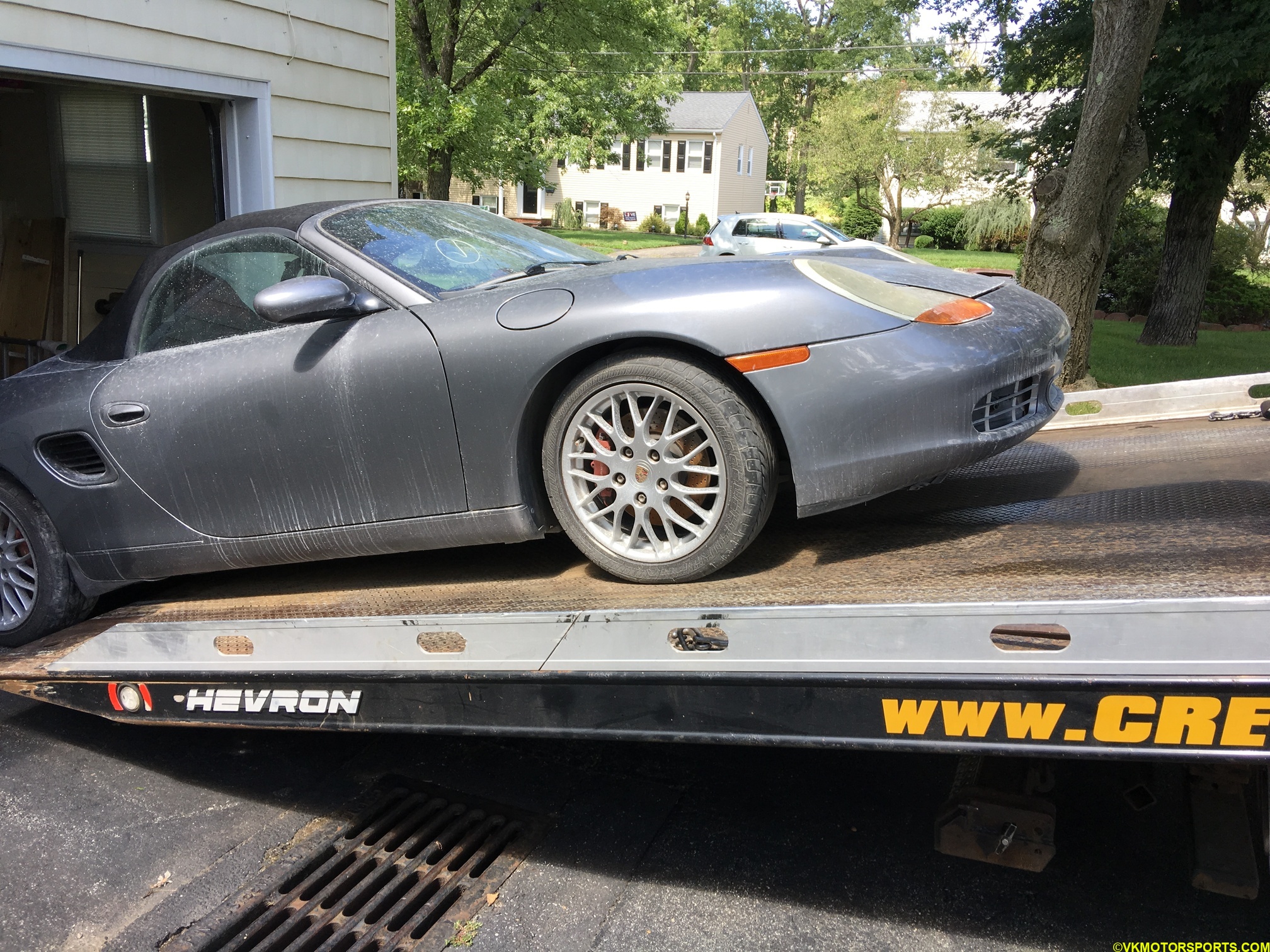 Figure 11. Boxster unloading from the flat-bed tow truck