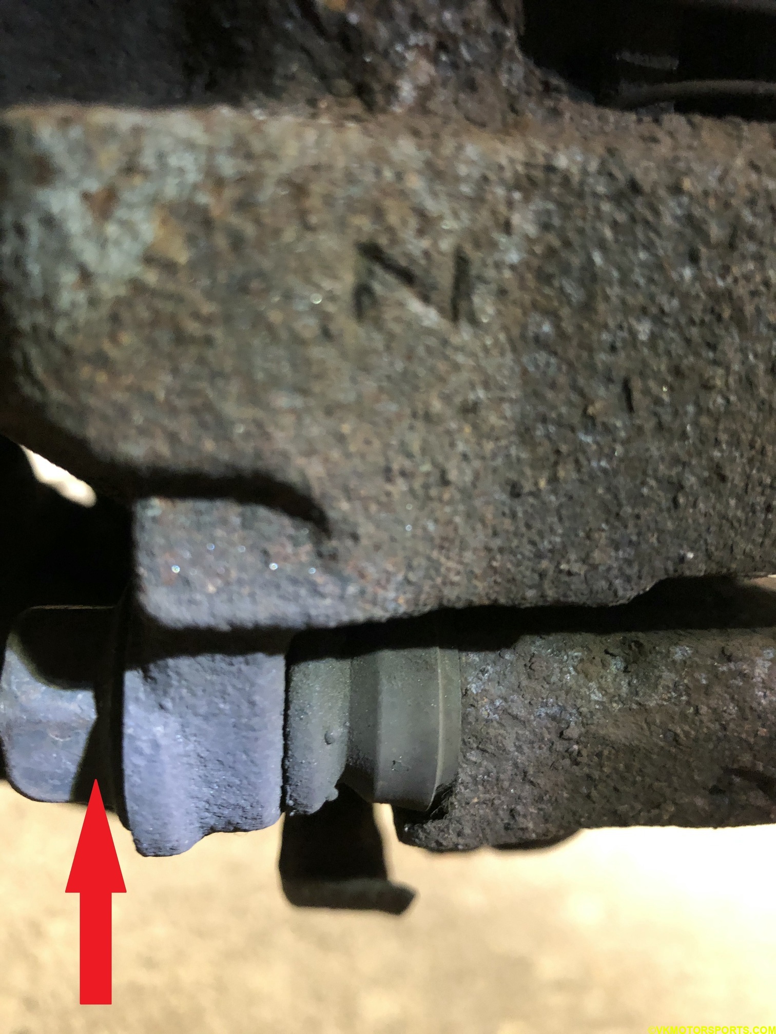 Figure 3. Locate the caliper bolt