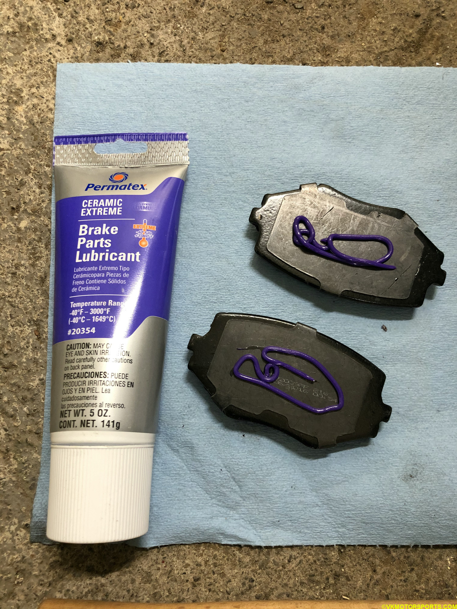 Figure 9. Apply anti-squeal lubricant to new pads