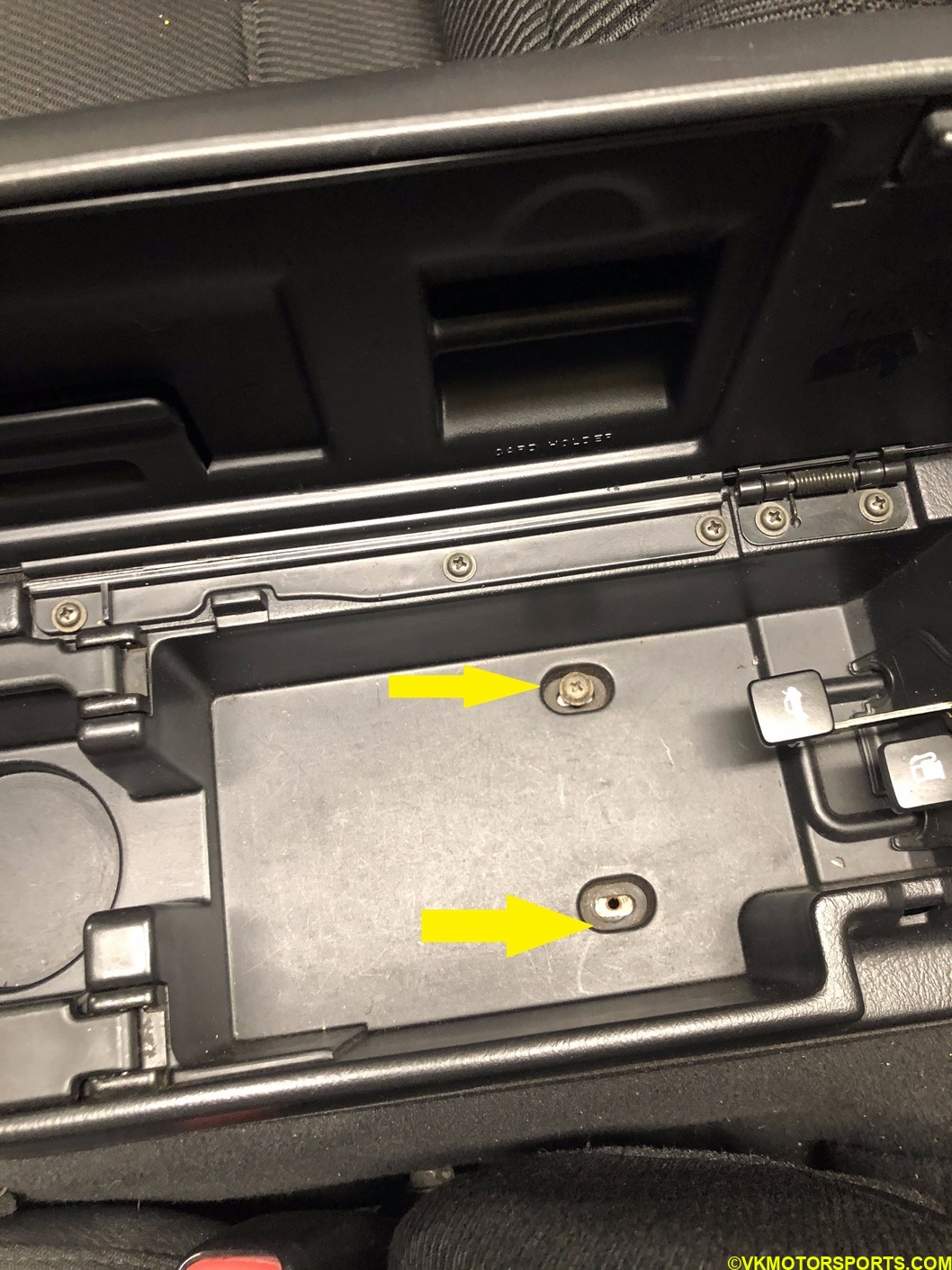 Figure 2a. Two screws in storage compartment