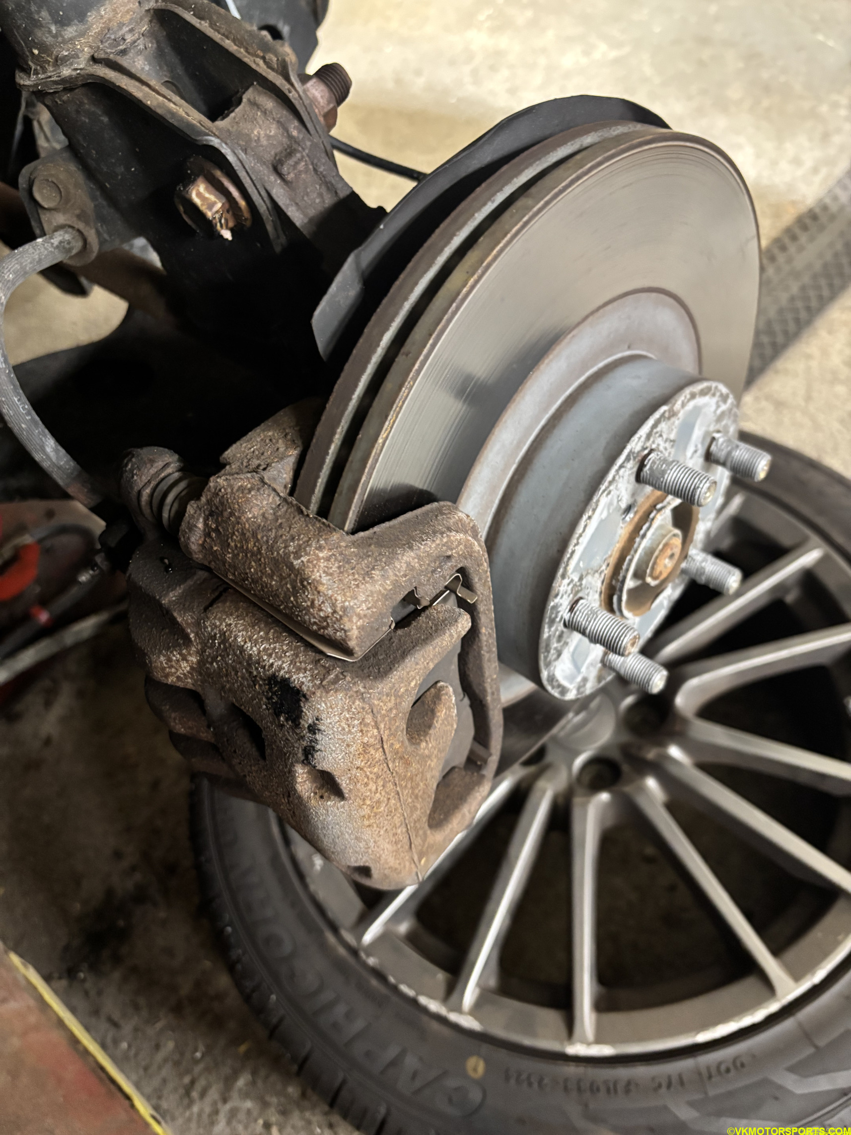 Figure 2. Front wheel removed and placed under the rotor