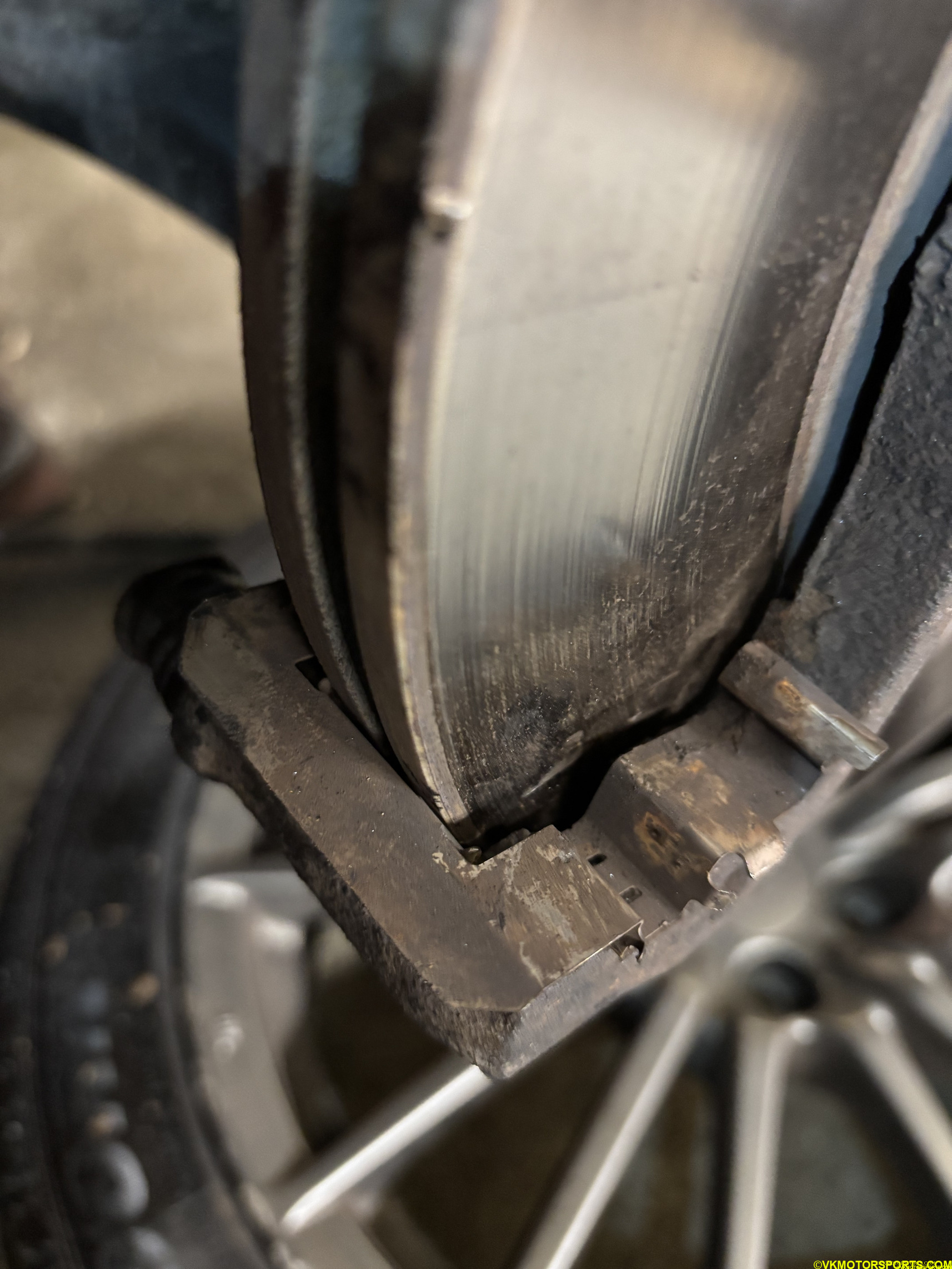 Figure 5. Front brake pads removed